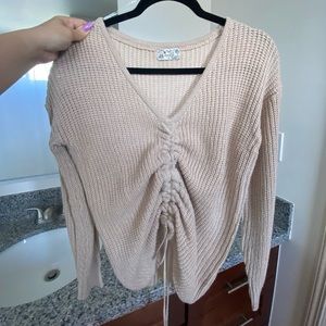 Beige drawstring knit sweater